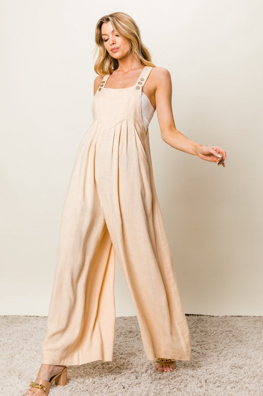 Get trendy with BiBi Texture Sleeveless Wide Leg Jumpsuit -  available at Mad Daisy. Grab yours for $62 today!